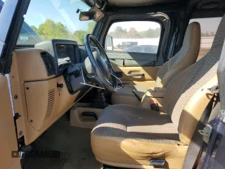 1997 Jeep Wrangler Sport with VIN 1J4FY19S0VP449796, listed as a Copart auction lot 74392904 with 139,322 mi miles and Clean Title. Bid and sale history available at carsss.com. Image 7.