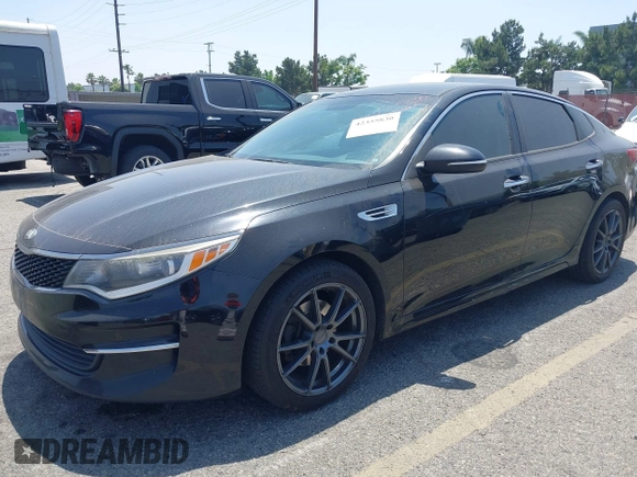 2016 Kia Optima LX with VIN 5XXGT4L3XGG008098, listed as a IAAI auction lot 42355830 with 203,517 mi miles and . Bid and sale history available at DreamBid. Image 2.