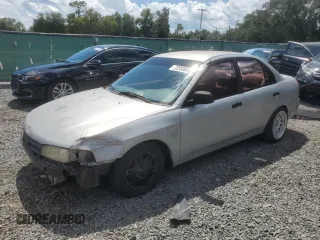 1998 Mitsubishi Mirage DE z VIN JA3AY26A6WU029219, wystawiony jako Copart lot #72253654 z przebiegiem Nie podano mil oraz Szkoda całkowita • Salvage title. Historia ofert i sprzedaży dostępna na DreamBid. Obrazek 1.