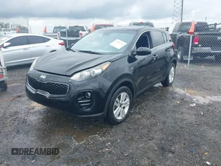 2018 Kia Sportage LX z VIN KNDPMCAC3J7335212, wystawiony jako IAAI lot #42092564 z przebiegiem 126 691 mil mil oraz . Historia ofert i sprzedaży dostępna na DreamBid. Obrazek 2.