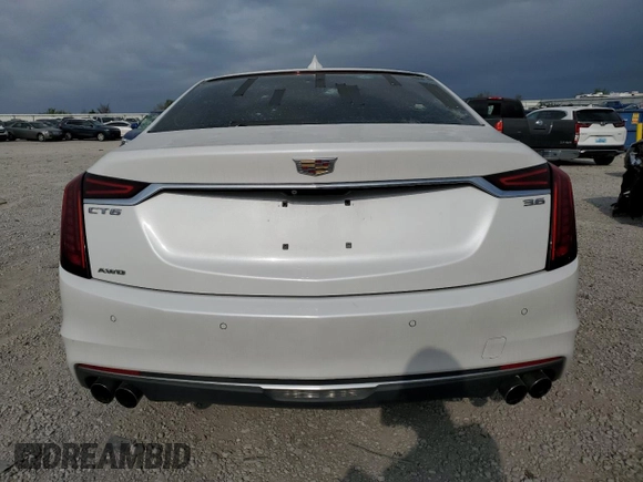2019 Cadillac CT6 Luxury AWD with VIN 1G6KB5RS7KU123104, listed as a Copart auction lot 54058065 with 75,921 mi miles and Salvage title. Bid and sale history available at DreamBid. Image 6.