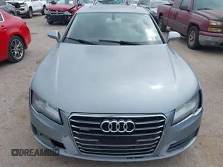 2013 Audi A7 Premium Plus with VIN WAUYGAFC1DN069906, listed as a IAAI auction lot 41906962 with 203,149 mi miles and . Bid and sale history available at DreamBid. Image 12.