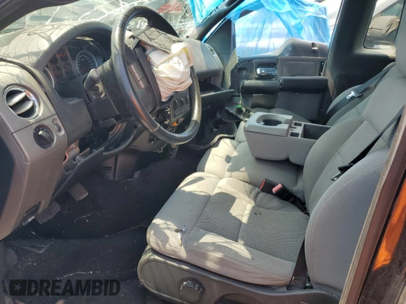 2004 Ford F-150 XL with VIN 1FTRF14544NB61476, listed as a Copart auction lot 59102324 with 142,110 mi miles and Salvage Title. Bid and sale history available at DreamBid. Image 7.