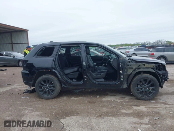2018 Jeep Grand Cherokee Laredo E with VIN 1C4RJFAG5JC280033, listed as a IAAI auction lot 41953744 with 69,269 mi miles and . Bid and sale history available at DreamBid. Image 14.