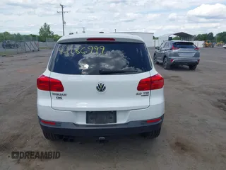 2014 Volkswagen Tiguan S with VIN WVGBV3AX0EW589381, listed as a IAAI auction lot 42186999 with 144,137 mi miles and . Bid and sale history available at DreamBid. Image 16.