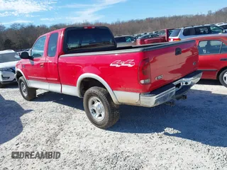2003 Ford F-150 XL with VIN 1FTRX18W03NA04817, listed as a IAAI auction lot 41599127 with 170,682 mi miles. Bid and sale history available at carsss.com. Image 3.
