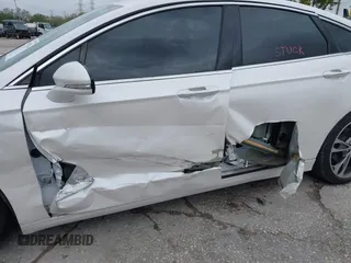 2017 Ford Fusion Titanium with VIN 3FA6P0K99HR272713, listed as a IAAI auction lot 41757334 with 104,733 mi miles. Bid and sale history available at carsss.com. Image 6.