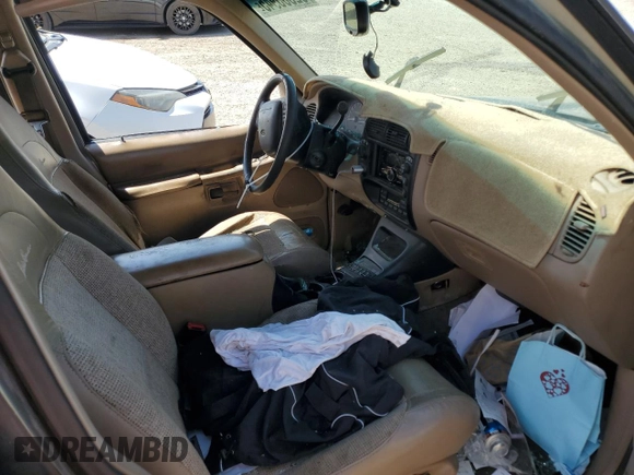 1999 Ford Explorer XLT с VIN 1FMZU34E6XZC13975, выставлен на аукционе Copart как лот 52385945 с пробегом 189 932 миль миль и Списание • Salvage title. История ставок и продаж доступна на DreamBid. Изображение 7.