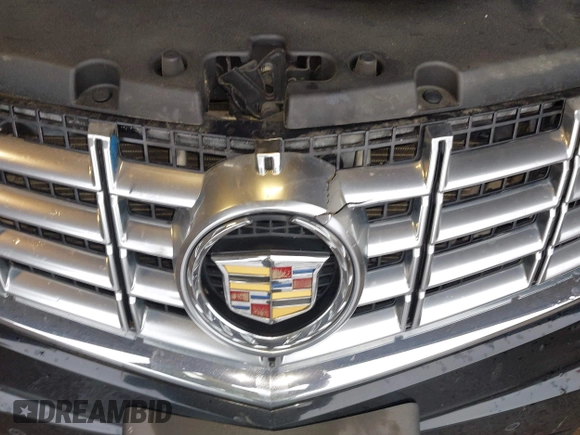 2014 Cadillac SRX Performance Collection with VIN 3GYFNFE39ES659013, listed as a IAAI auction lot 42264069 with 129,122 mi miles and . Bid and sale history available at DreamBid. Image 19.