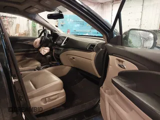 2016 Honda Pilot EX-L with VIN 5FNYF6H58GB012753, listed as a IAAI auction lot 41139479 with 175,842 mi miles and . Bid and sale history available at DreamBid. Image 5.