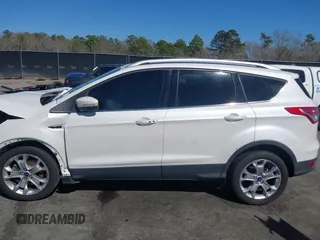 2015 Ford Escape Titanium with VIN 1FMCU0J94FUA69088, listed as a IAAI auction lot 41810406 with 167,749 mi miles. Bid and sale history available at carsss.com. Image 14.