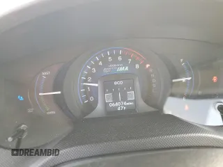 2012 Honda Insight z VIN JHMZE2H32CS000284, wystawiony jako Copart lot #50160335 z przebiegiem 64 074 mil mil oraz Szkoda całkowita • Salvage title. Historia ofert i sprzedaży dostępna na DreamBid. Obrazek 9.