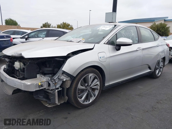 2018 Honda Clarity Touring with VIN JHMZC5F32JC014588, listed as a IAAI auction lot 42066633 with 89,316 mi miles. Bid and sale history available at carsss.com. Image 2.