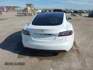 2020 Tesla Model S Long Range with VIN 5YJSA1E23LF360441, listed as a IAAI auction lot 41312865 with 68,967 mi miles and . Bid and sale history available at DreamBid. Image 16.