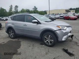 2018 Toyota RAV4 XLE with VIN 2T3RFREV8JW741461, listed as a Copart auction lot 57728244 with 88,925 mi miles and Salvage Title. Bid and sale history available at DreamBid. Image 4.