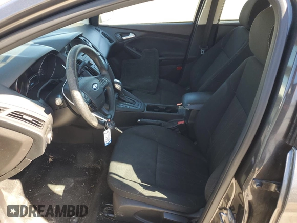 2015 Ford Focus SE с VIN 1FADP3F22FL299799, выставлен на аукционе Copart как лот 42420665 с пробегом 141 349 миль миль и Списание • Salvage title. История ставок и продаж доступна на DreamBid. Изображение 7.