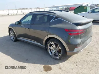 2024 Genesis GV60 z VIN KMUKEDSBXRU021487, wystawiony jako IAAI lot #41593903 z przebiegiem 10 961 mil mil oraz . Historia ofert i sprzedaży dostępna na DreamBid. Obrazek 3.