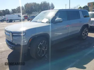 2025 Rivian R1S Adventure z VIN 7PDSGBBA1SN060468, wystawiony jako IAAI lot #41711770 z przebiegiem 2865 mil mil oraz . Historia ofert i sprzedaży dostępna na DreamBid. Obrazek 2.