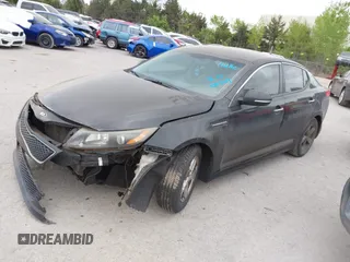 2015 Kia Optima LX with VIN 5XXGM4A77FG357303, listed as a IAAI auction lot 42078648 with 181,904 mi miles. Bid and sale history available at carsss.com. Image 2.