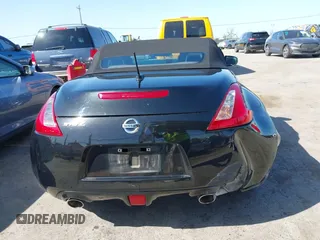 2014 Nissan 370Z Touring with VIN JN1AZ4FH8EM620208, listed as a IAAI auction lot 42094292 with 68,799 mi miles and . Bid and sale history available at DreamBid. Image 16.
