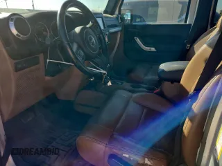 2012 Jeep Wrangler Unlimited Call of Duty MW3 с VIN 1C4BJWFG3CL103865, выставлен на аукционе Copart как лот 74237754 с пробегом 104 232 миль миль и Списание • Salvage title. История ставок и продаж доступна на DreamBid. Изображение 7.