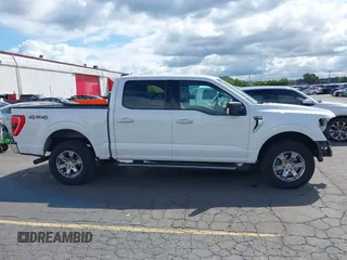 2021 Ford F-150 XL with VIN 1FTFW1E56MFA73752, listed as a IAAI auction lot 42267561 with 86,438 mi miles and . Bid and sale history available at DreamBid. Image 14.
