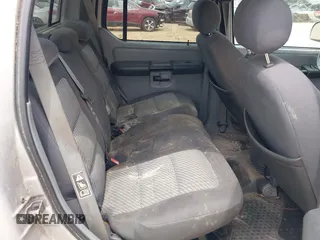 2003 Ford Explorer Sport Trac XLS z VIN 1FMZU67E53UC26334, wystawiony jako IAAI lot #42088444 z przebiegiem 175 922 mil mil oraz . Historia ofert i sprzedaży dostępna na DreamBid. Obrazek 8.