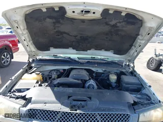 2005 Chevrolet Silverado 1500 LS with VIN 2GCEC19V351168700, listed as a IAAI auction lot 42018925 with 229,386 mi miles. Bid and sale history available at carsss.com. Image 10.