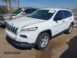 2016 Jeep Cherokee Altitude with VIN 1C4PJLAB2GW212337, listed as a IAAI auction lot 42148601 with 156,012 mi miles and . Bid and sale history available at DreamBid. Image 2.