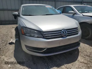 2014 Volkswagen Passat Wolfsburg Edition with VIN 1VWAT7A30EC096244, listed as a Copart auction lot 54097505 with 153,321 mi miles and Salvage title. Bid and sale history available at DreamBid. Image 5.