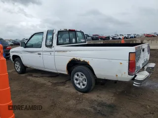 1997 Nissan Frontier XE with VIN 1N6SD16S8VC426940, listed as a Copart auction lot 55860235 with 242,265 mi miles and Salvage title. Bid and sale history available at DreamBid. Image 2.