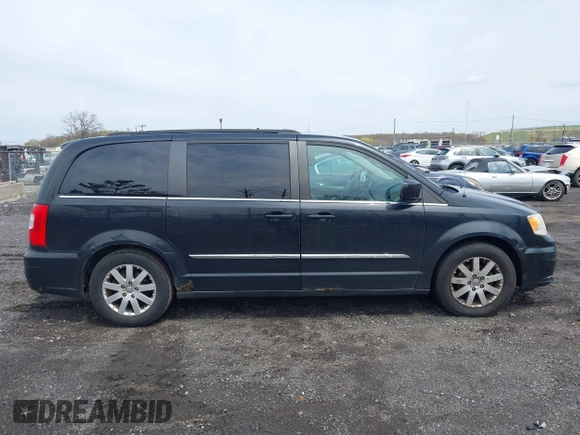 2011 Chrysler Town & Country Touring L with VIN 2A4RR8DG7BR641782, listed as a IAAI auction lot 42042025 with 141,884 mi miles and . Bid and sale history available at DreamBid. Image 12.