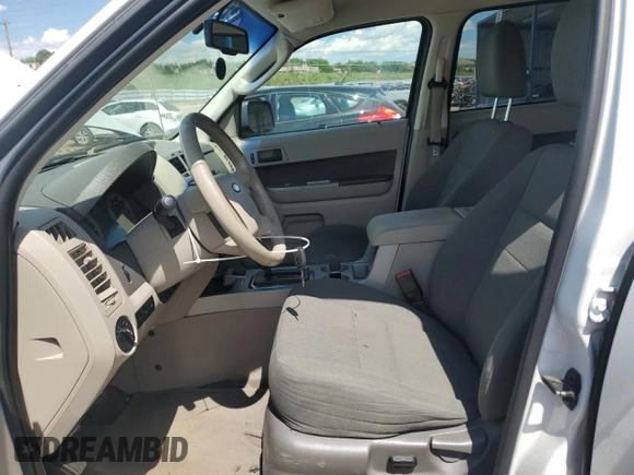 2009 Ford Escape Hybrid with VIN 1FMCU59319KA32481, listed as a Copart auction lot 60636465 with 68,541 mi miles and Salvage title. Bid and sale history available at DreamBid. Image 7.