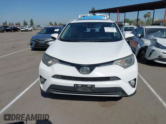 2018 Toyota RAV4 XLE with VIN 2T3WFREV7JW480326, listed as a IAAI auction lot 42021965 with 174,347 mi miles. Bid and sale history available at carsss.com. Image 13.