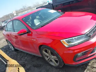 2016 Volkswagen Jetta Sedan 2.0T GLI SE with VIN 3VW5T7AJ0GM357177, listed as a IAAI auction lot 41769034 with 127,324 mi miles. Bid and sale history available at carsss.com. Image 13.