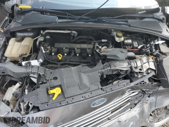 2018 Ford Focus Titanium z VIN 1FADP3N20JL271719, wystawiony jako Copart lot #60784755 z przebiegiem 116 118 mil mil oraz Szkoda całkowita • Salvage title. Historia ofert i sprzedaży dostępna na DreamBid. Obrazek 11.