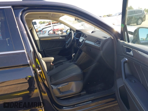 2024 Volkswagen Tiguan SE with VIN 3VVNB7AXXRM199400, listed as a IAAI auction lot 42216941 with 11,581 mi miles and . Bid and sale history available at DreamBid. Image 5.