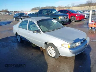 1999 Ford Escort SE with VIN 1FAFP13P8XW185612, listed as a IAAI auction lot 41097304 with 221,752 mi miles. Bid and sale history available at carsss.com. Image 1.