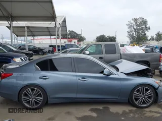 2015 Infiniti Q50 Premium with VIN JN1BV7AP1FM351633, listed as a IAAI auction lot 41880366 with 106,564 mi miles. Bid and sale history available at carsss.com. Image 14.