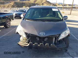 2015 Toyota Sienna LE AAS with VIN 5TDKK3DC3FS529845, listed as a IAAI auction lot 41627102 with 130,334 mi miles. Bid and sale history available at carsss.com. Image 13.