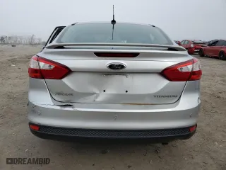2012 Ford Focus Titanium with VIN 1FAHP3J21CL293447, listed as a Copart auction lot 43963615 with 151,448 mi miles and Salvage Title. Bid and sale history available at carsss.com. Image 6.