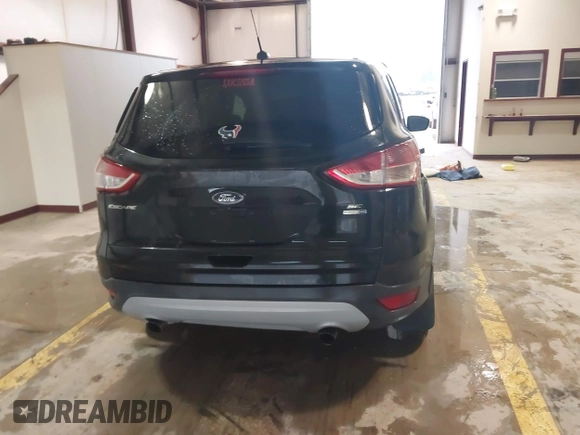 2014 Ford Escape SE z VIN 1FMCU9GX6EUB69007, wystawiony jako IAAI lot #41710065 z przebiegiem 113 080 mil mil oraz . Historia ofert i sprzedaży dostępna na DreamBid. Obrazek 15.