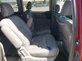 2003 Honda Odyssey EX-L with VIN 5FNRL18963B009184, listed as a IAAI auction lot 42004581 with 125,788 mi miles and . Bid and sale history available at DreamBid. Image 8.