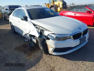 2019 BMW 5 Series 530e iPerformance with VIN WBAJA9C59KB393045, listed as a IAAI auction lot 40994533 with 64,070 mi miles. Bid and sale history available at carsss.com. Image 1.
