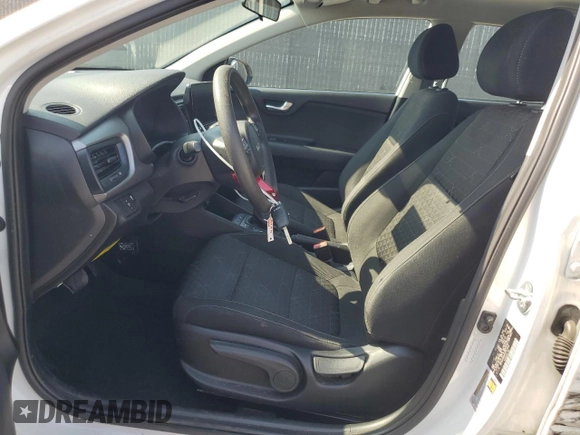 2023 Kia Rio S z VIN 3KPA24AD4PE561052, wystawiony jako Copart lot #55316785 z przebiegiem 94 184 mil mil oraz Nie do naprawy • Non repairable. Historia ofert i sprzedaży dostępna na DreamBid. Obrazek 7.