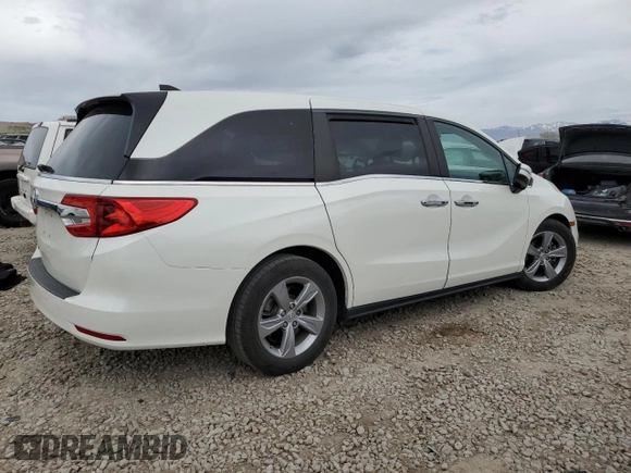 2018 Honda Odyssey EX-L with VIN 5FNRL6H71JB059936, listed as a Copart auction lot 53403635 with 94,745 mi miles and Salvage Title. Bid and sale history available at DreamBid. Image 3.
