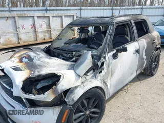 2014 MINI Countryman S with VIN WMWZC3C55EWT00416, listed as a IAAI auction lot 42031870 with Not Provided miles and . Bid and sale history available at DreamBid. Image 6.