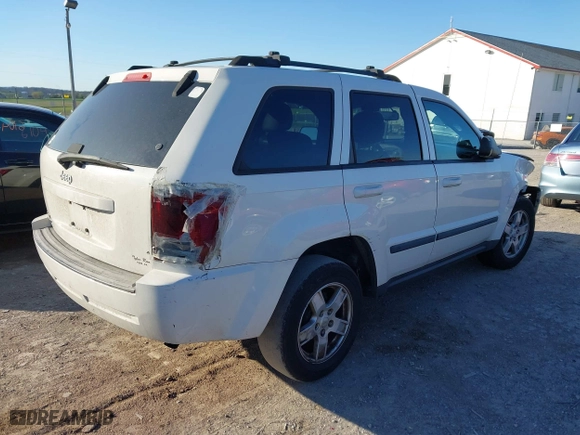2007 Jeep Grand Cherokee Laredo with VIN 1J8GR48K37C525797, listed as a IAAI auction lot 41929118 with 244,092 mi miles. Bid and sale history available at carsss.com. Image 4.