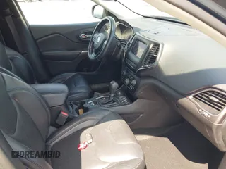 2020 Jeep Cherokee Altitude with VIN 1C4PJMLX7LD636746, listed as a IAAI auction lot 42271942 with 54,435 mi miles and . Bid and sale history available at DreamBid. Image 5.