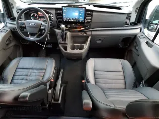 2023 Ford Transit with VIN 1FBVU4X8XPKB63870, listed as a Copart auction lot 82731504 with 7,576 mi miles and Salvage Title. Bid and sale history available at DreamBid. Image 8.